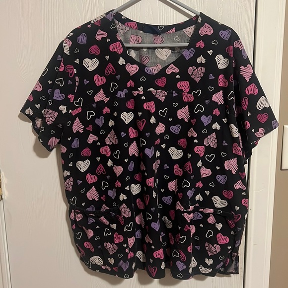 No longer wear scrubs. Brand is Sanibel scrubs. - Picture 1 of 2